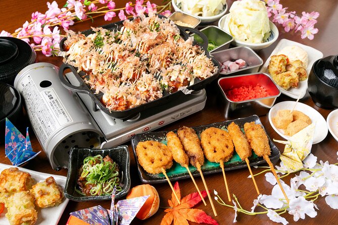 1 Day Takoyaki Making and Osaka Castle Walking Tour - Aqua Liner and Osaka Castle: river views, then Hideyoshi’s symbol