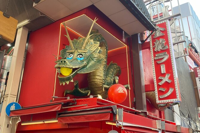 Guided Tour of Some Attractions in Osaka by Private Car - Kuromon Market: One Hour of Osaka Eating Culture