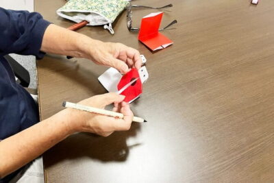 Japanese miniature kimono made with origami in Osaka - Inside the Classroom: Paper Choice, Practice Folds, and Getting Unstuck