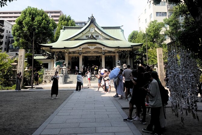 Osaka 4-Hour Walking Tour: Hotspots and Hidden Gems - Kuromon Market: Osaka’s Kitchen and the Art of Eating on the Move