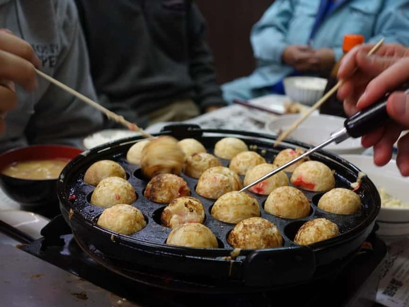 Osaka: Food Tour Kuromon Market & Dotonbori with Guide - Mitoya and the Hozenji Area: Dango, Streets, and Small-Place Charm