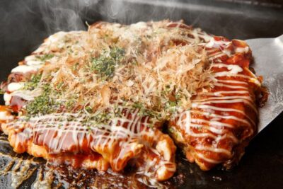 Osaka: Local Foodie Tour in Dotonbori and Shinsekai - Shinsekai at street level: retro alleys and Tsutenkaku’s shadow
