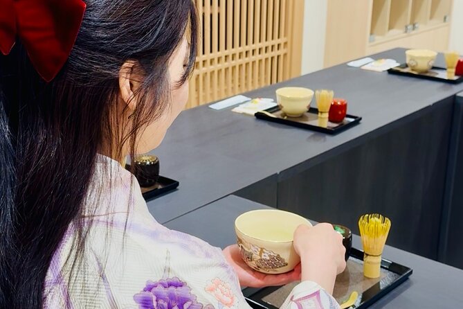 Tea and Calligraphy Session at a Table in Osaka - Key highlights to look for